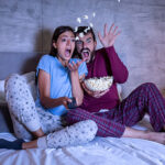 Couple watching a horror movie