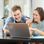 Couple buying online together at home
